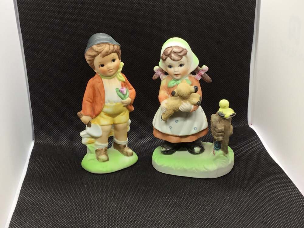 Set of 2 Boy and Girl Porcelain Figurine